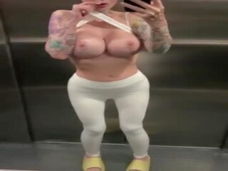 Bald street girl squirting orgasm in public elevator