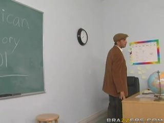 Naughty busty blonde young female flashing her ass in the classroom