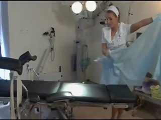 Grand Nurse In Tan Stockings And Heels In Hospital - Dorcel